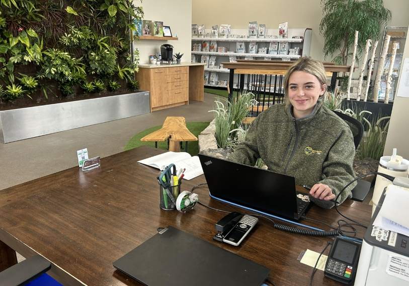Receptionist sitting on the front desk