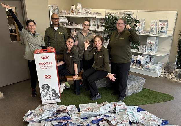 Team posing for recycle program