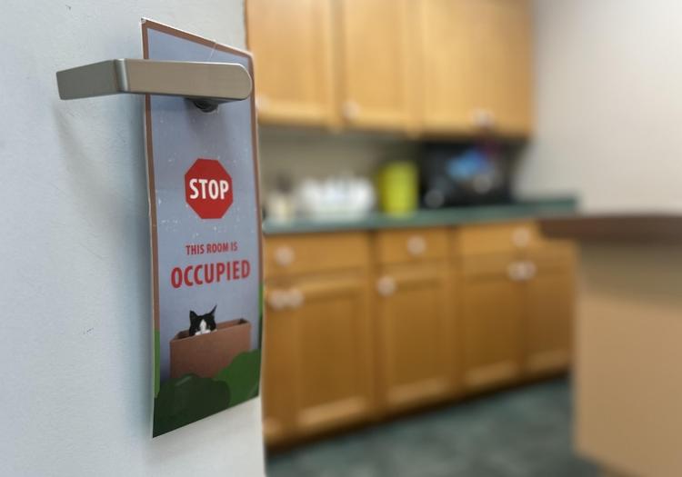stop sign hanging on a door